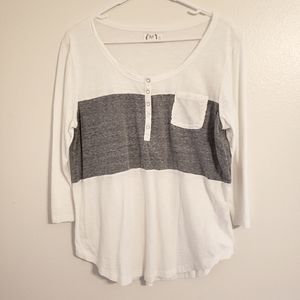 Womens size XL. White shirt with gray stripe and snap detail. 3/4 Length Sleeve.